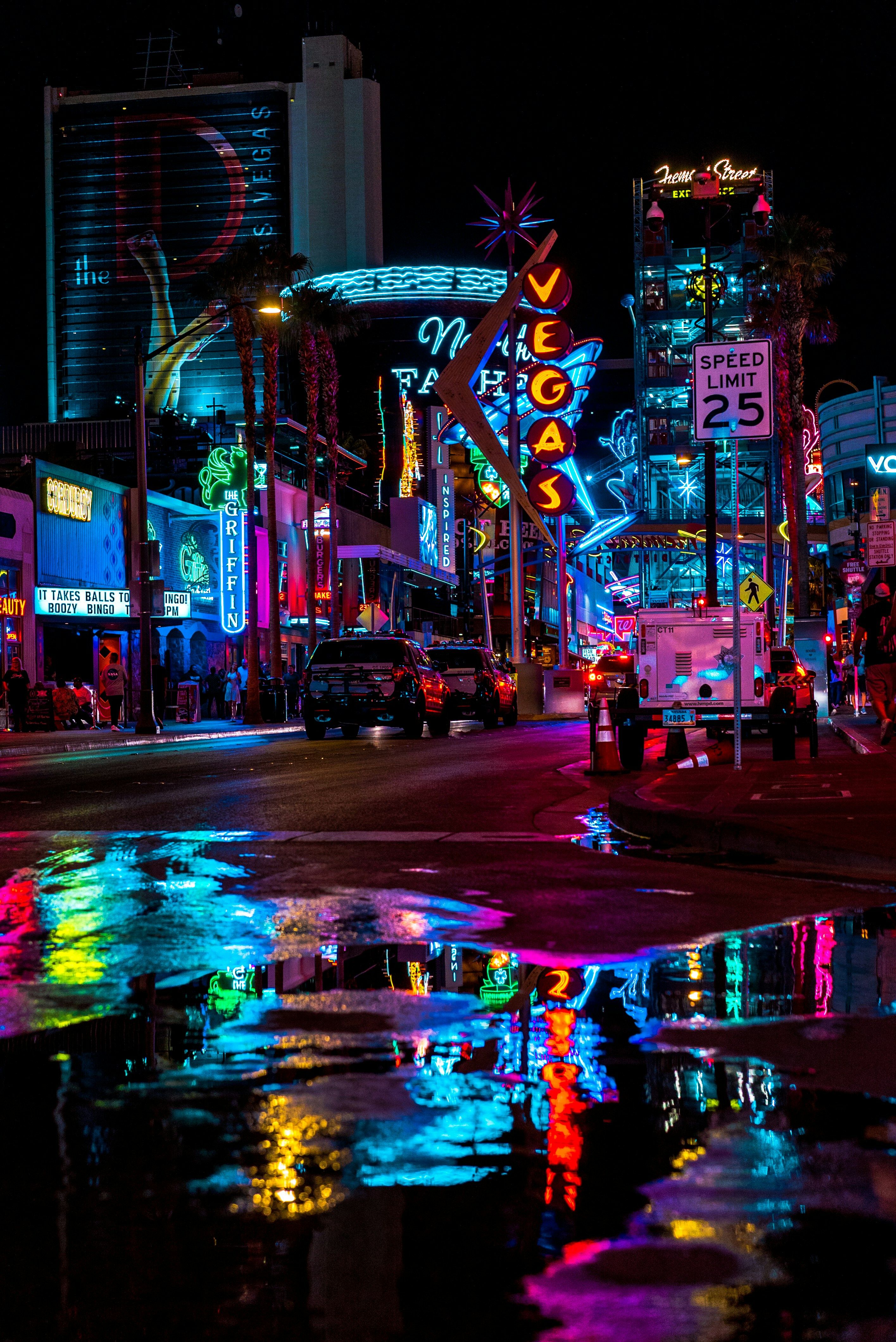 Neon Night Reflections on Wet Streets Download Wallpapers