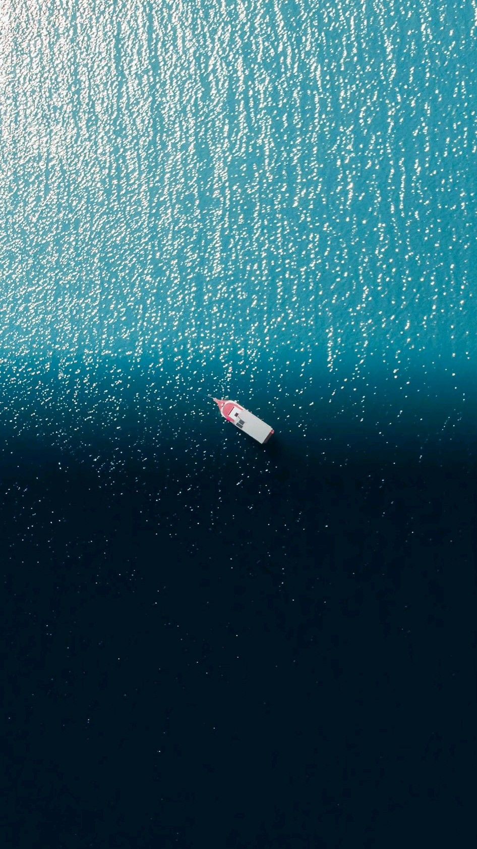 Ocean Drift: Minimal Bottle Scene Download Wallpapers