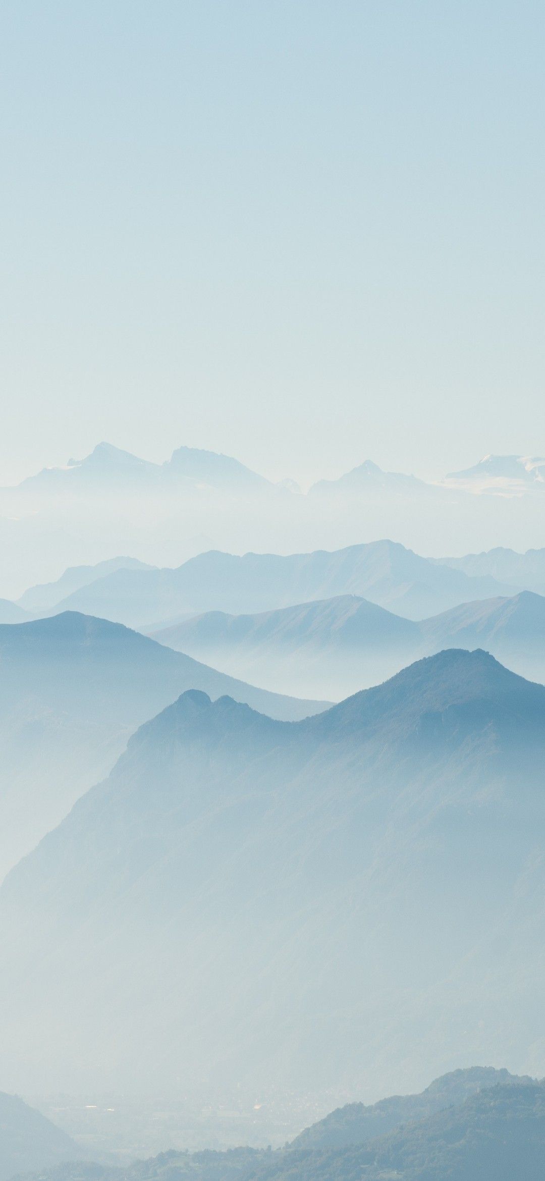 Misty Peaks from Above Download Wallpapers