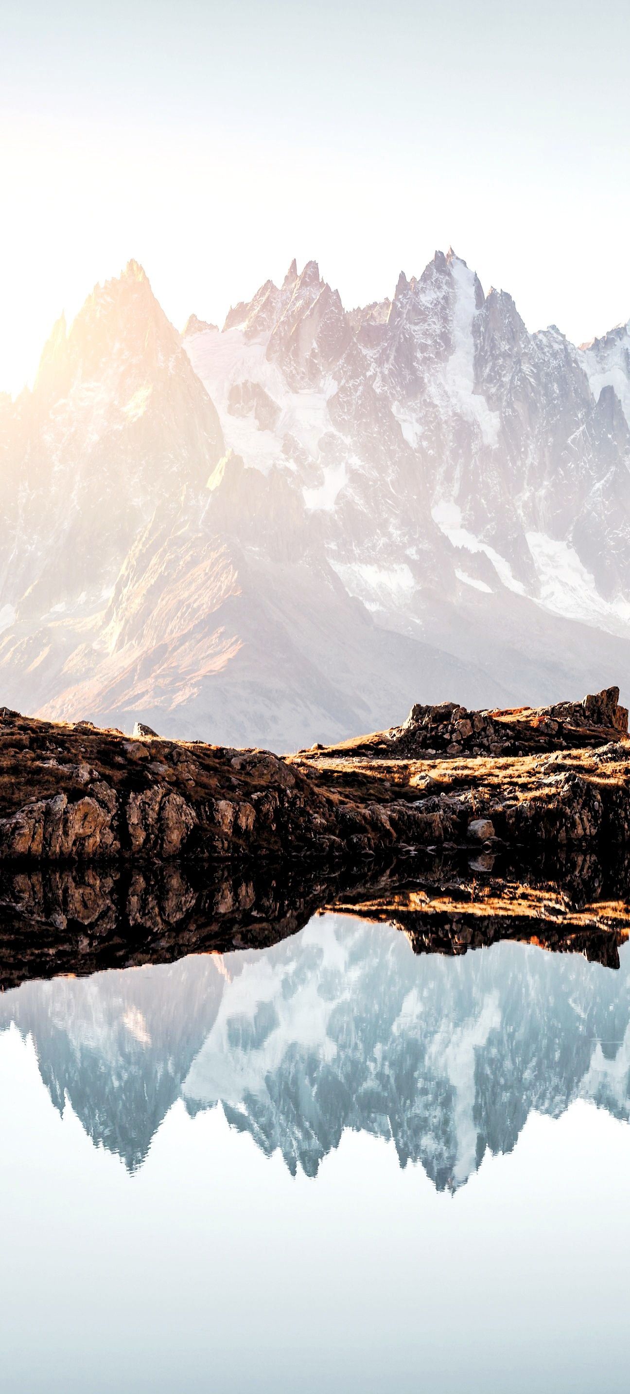 Mountain Reflections in Serene Lake Download Wallpapers
