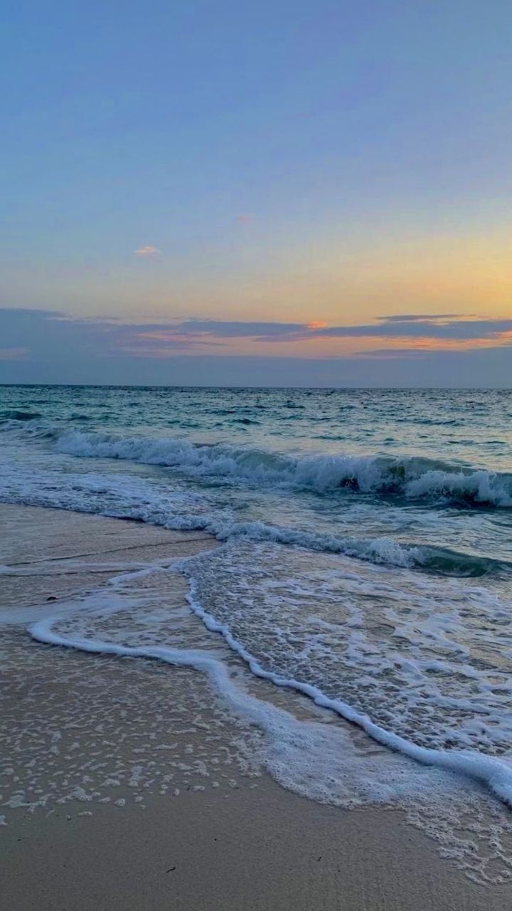Golden Sunset Over Ocean Waves Download Wallpapers